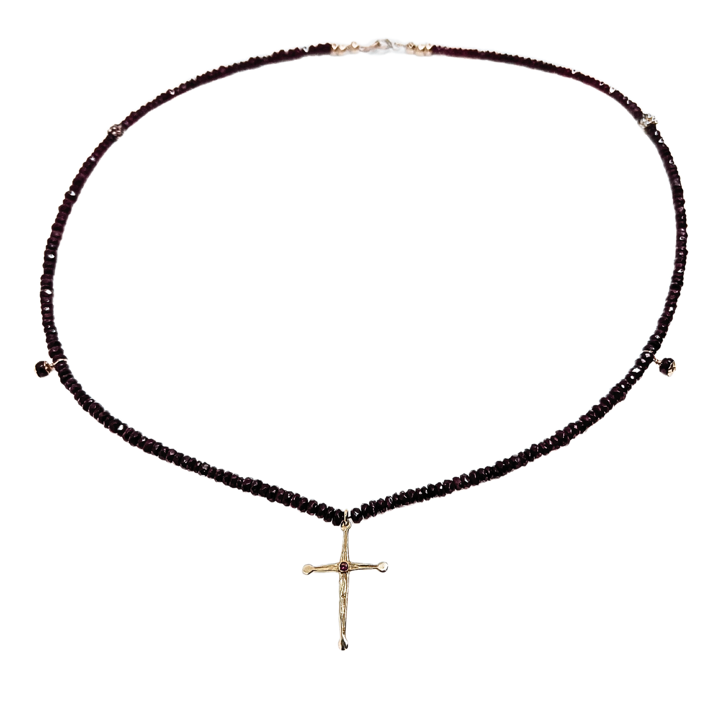 delicate ruby necklace with gold cross